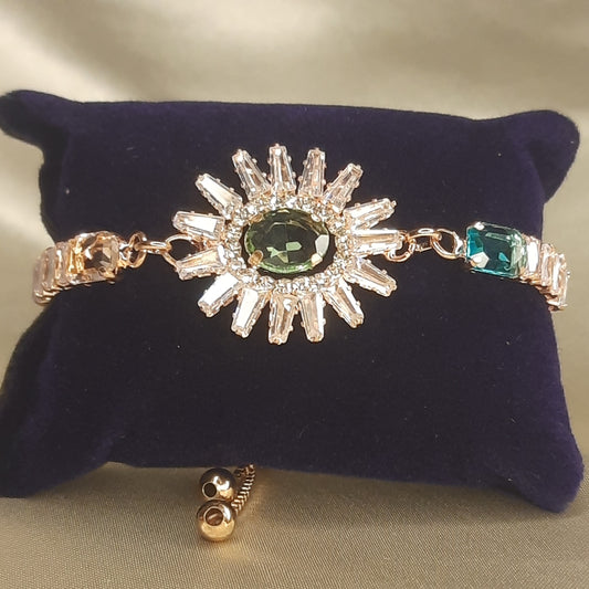 The Helios Emerald Sunburst Bolo Bracelet