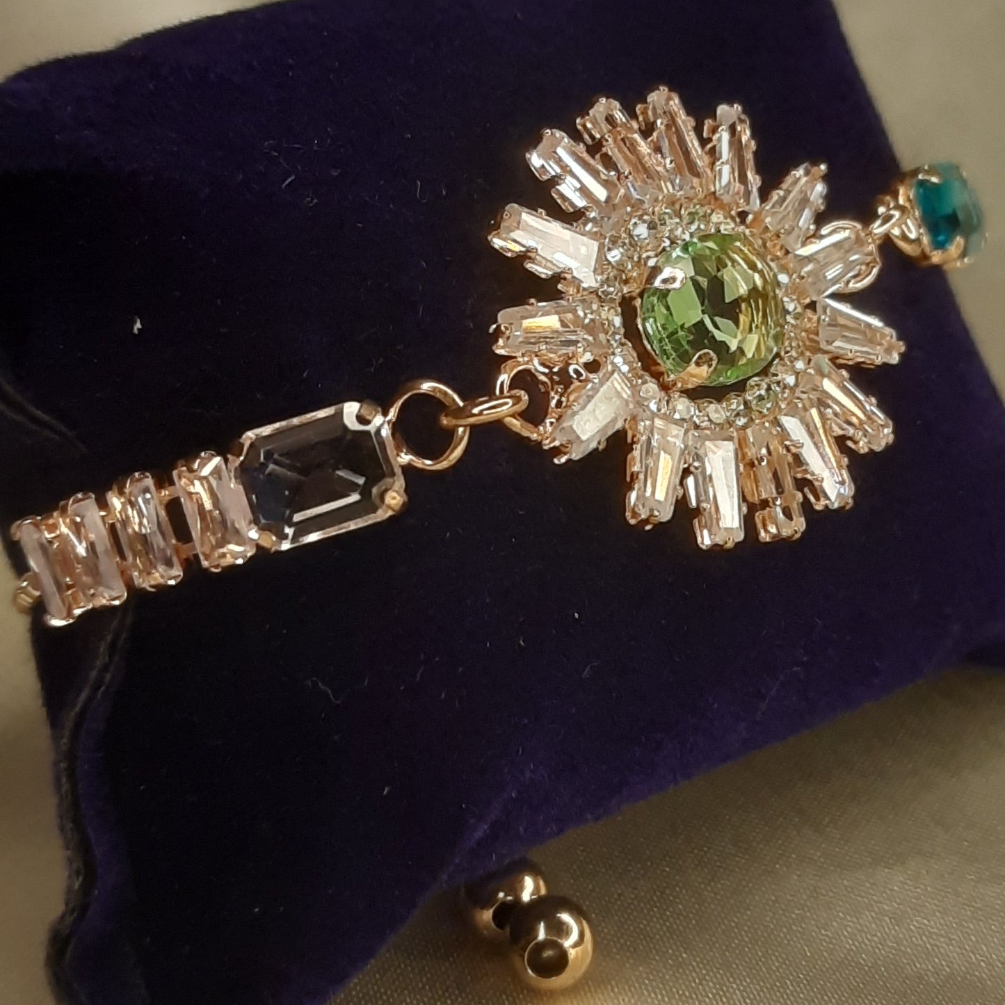 The Helios Emerald Sunburst Bolo Bracelet