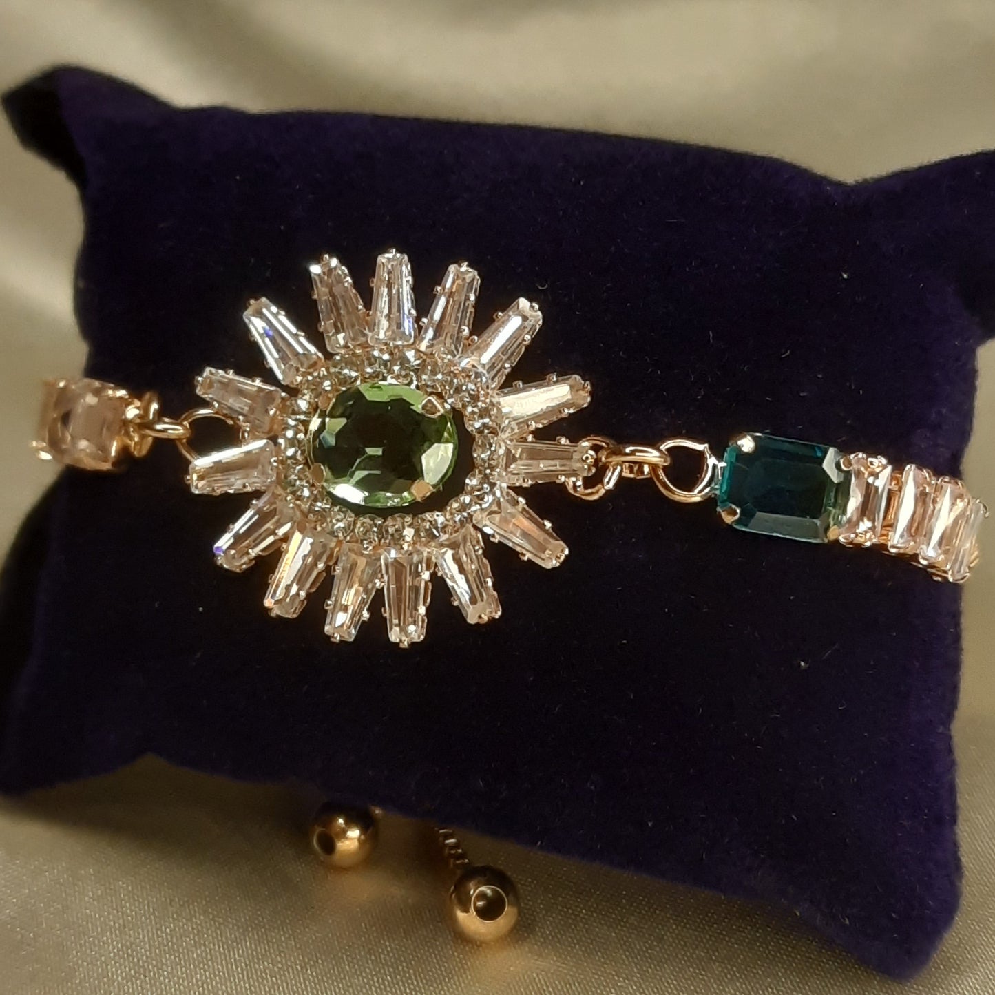 The Helios Emerald Sunburst Bolo Bracelet