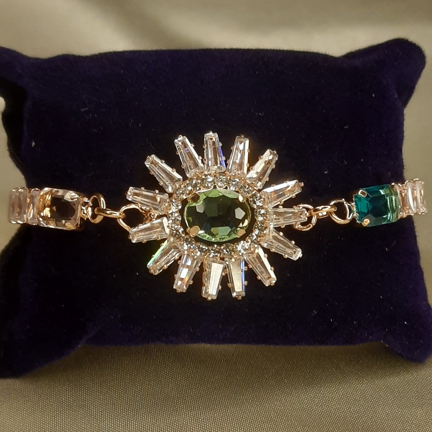 The Helios Emerald Sunburst Bolo Bracelet