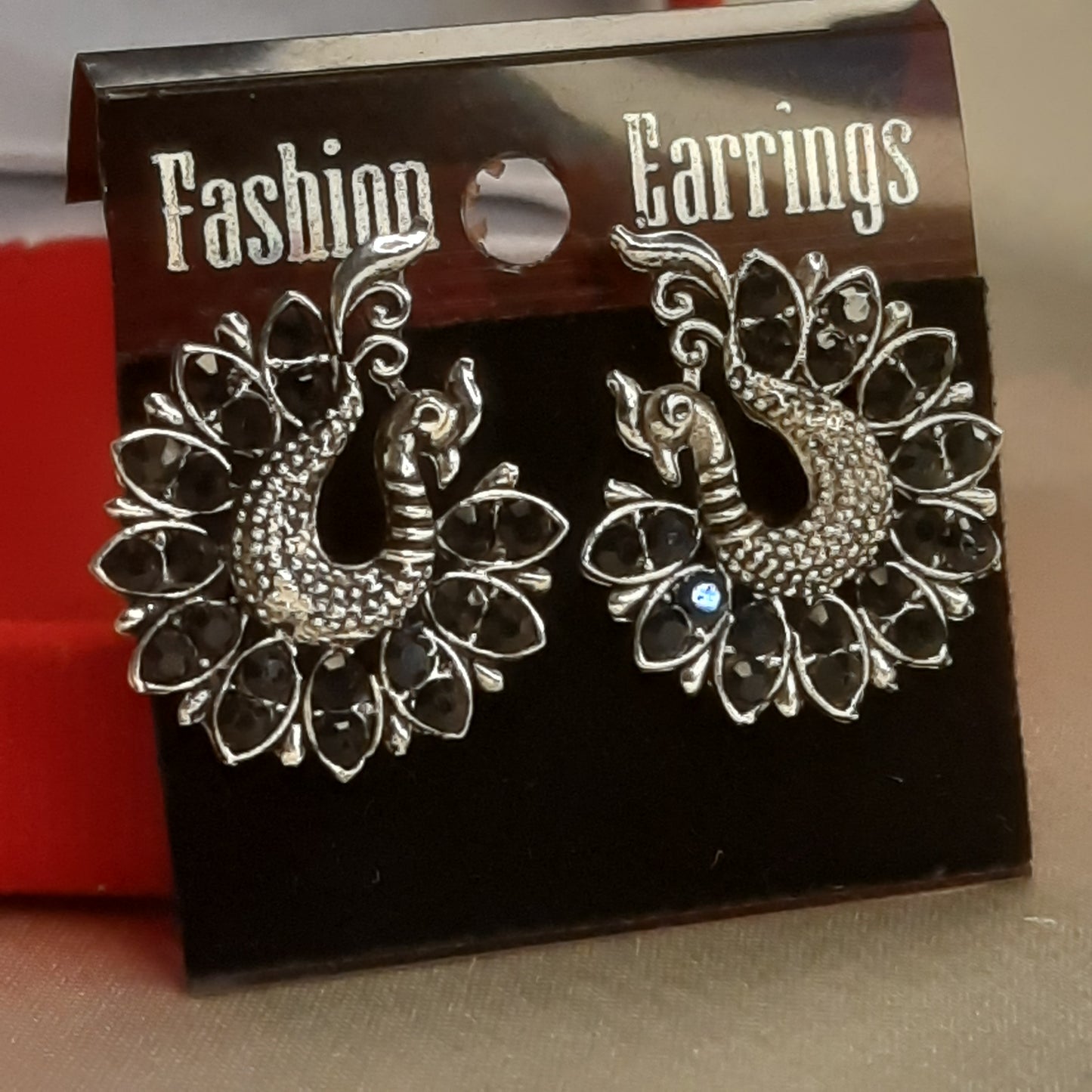 The Shadow Peacock Studs