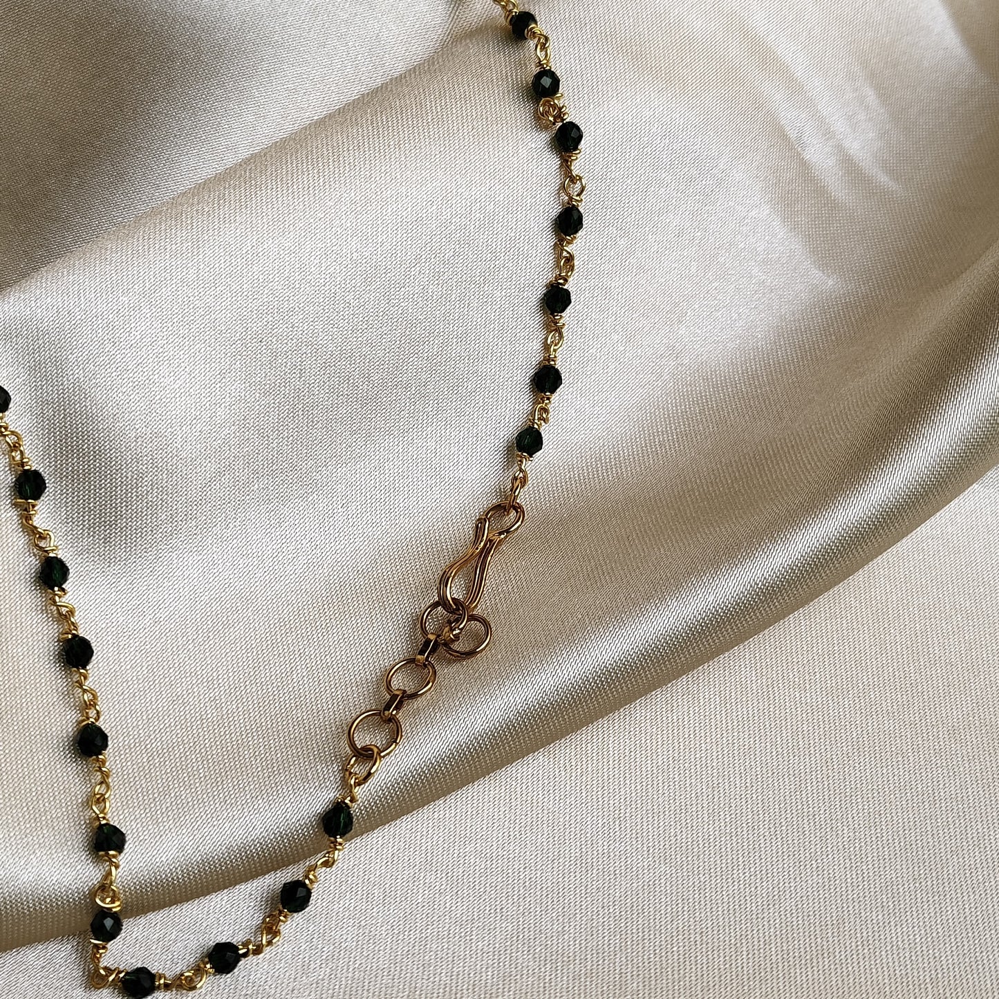 Elegant Gold-Plated Necklace with Green Stone and Crystal Accents
