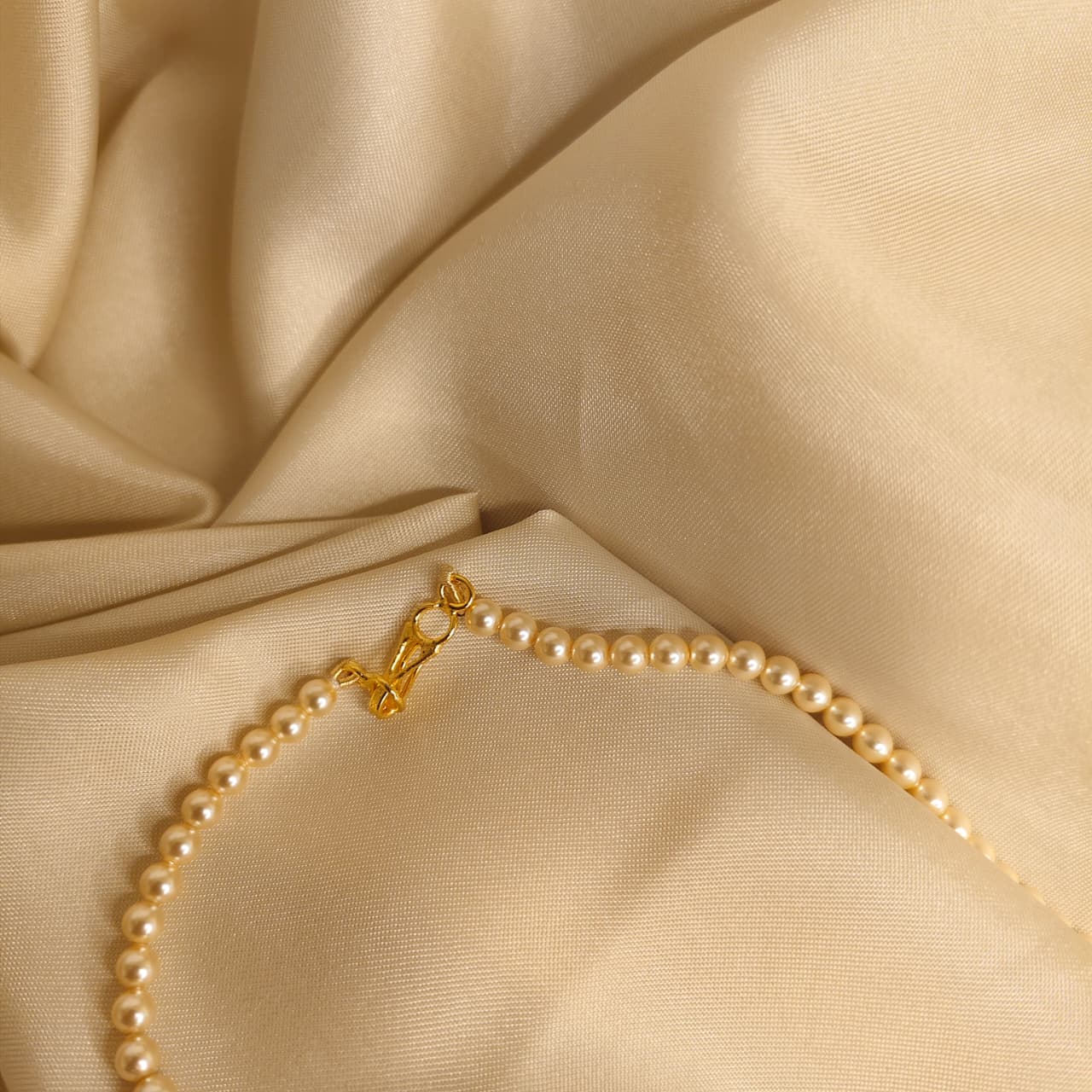 The Light Gold One Strand Swarovski Lumière Pearl Necklace