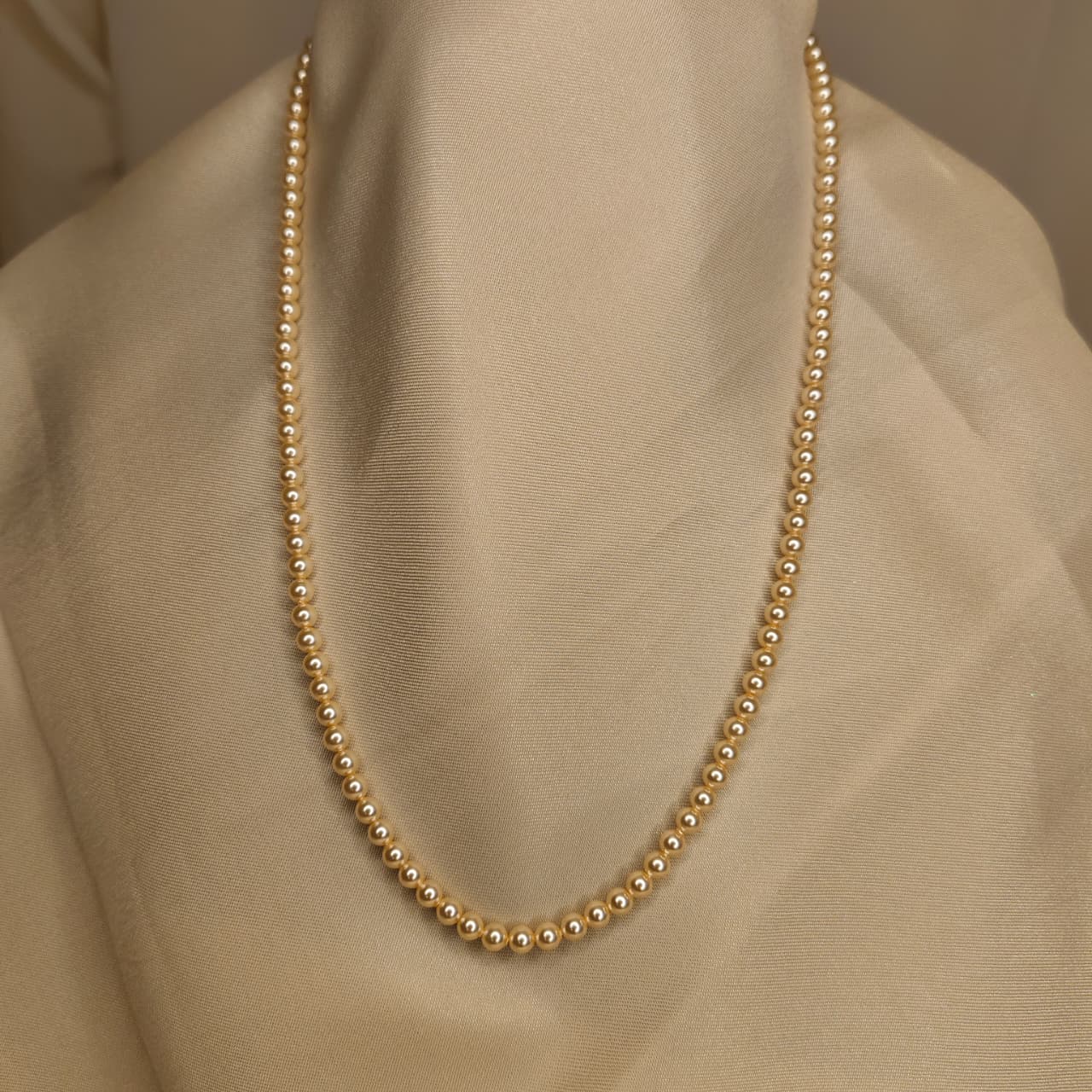 The Light Gold One Strand Swarovski Lumière Pearl Necklace