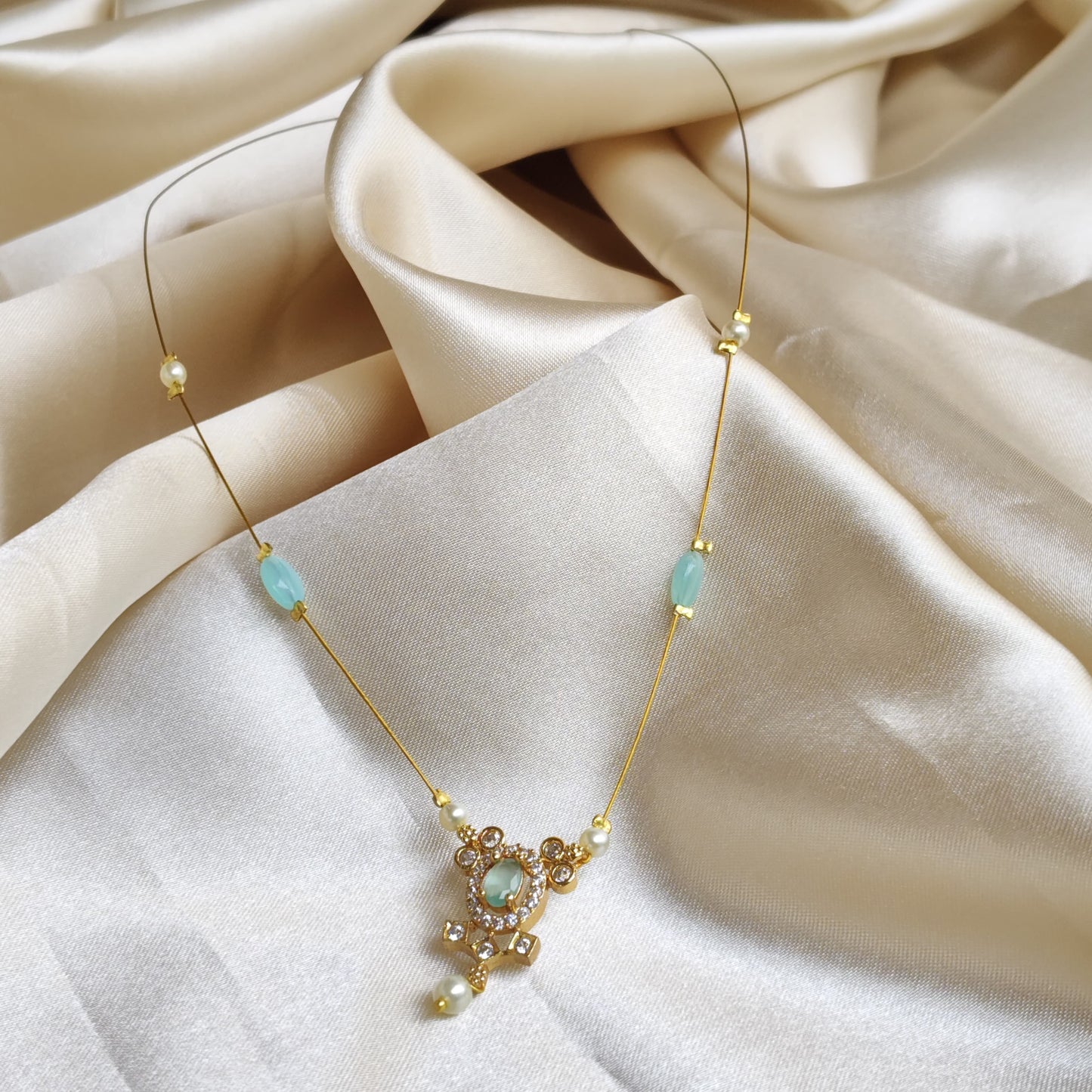 The Aditi Aqua & Pearl Invisible Chain