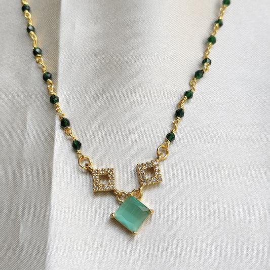 Elegant Gold-Plated Necklace with Green Stone and Crystal Accents