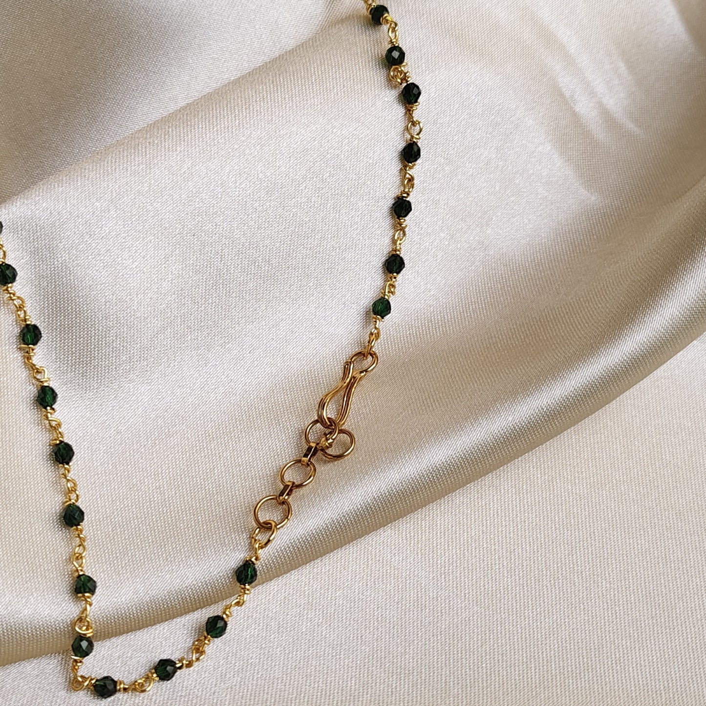 Elegant Gold-Plated Necklace with Green Stone and Crystal Accents