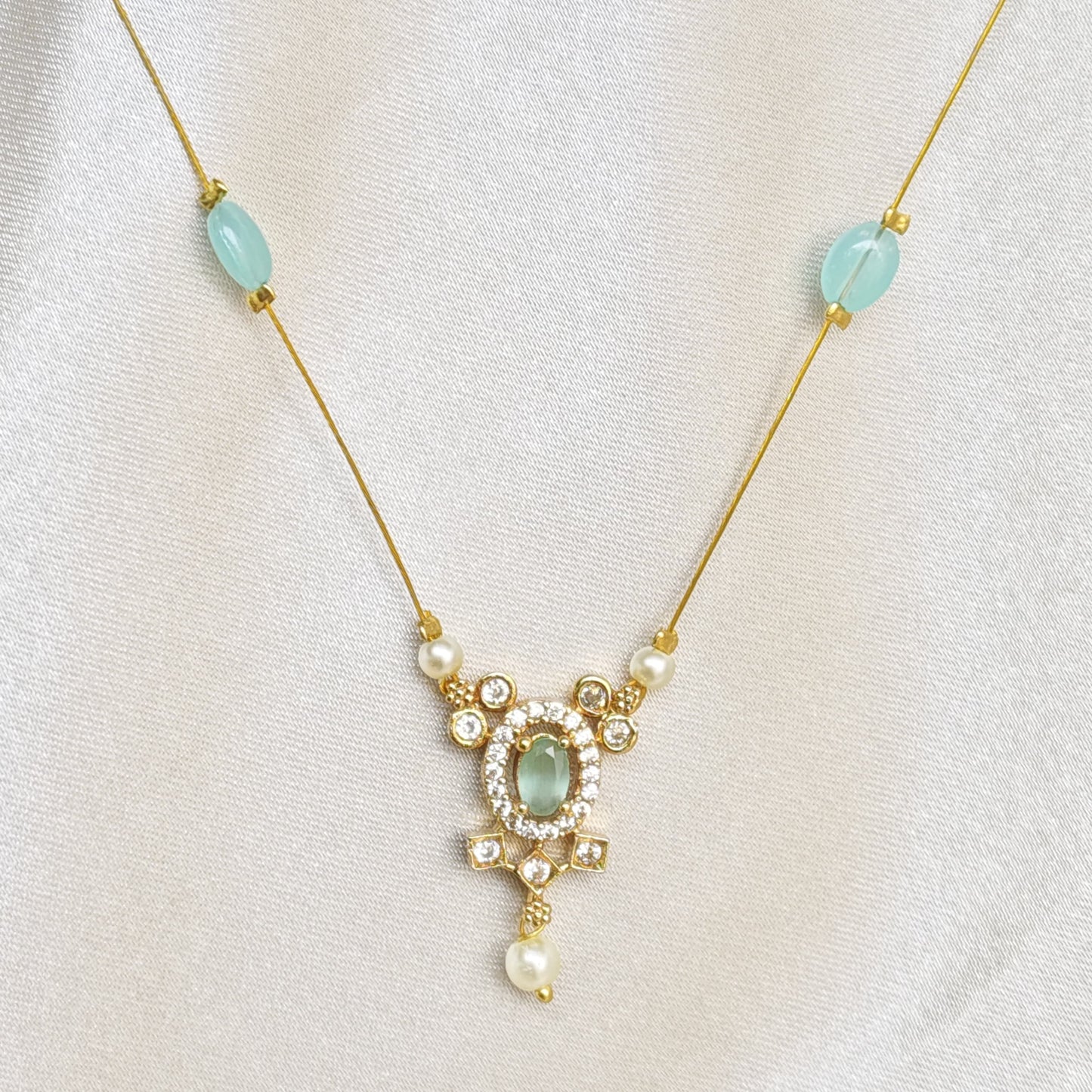 The Aditi Aqua & Pearl Invisible Chain
