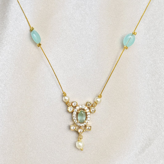 The Aditi Aqua & Pearl Invisible Chain