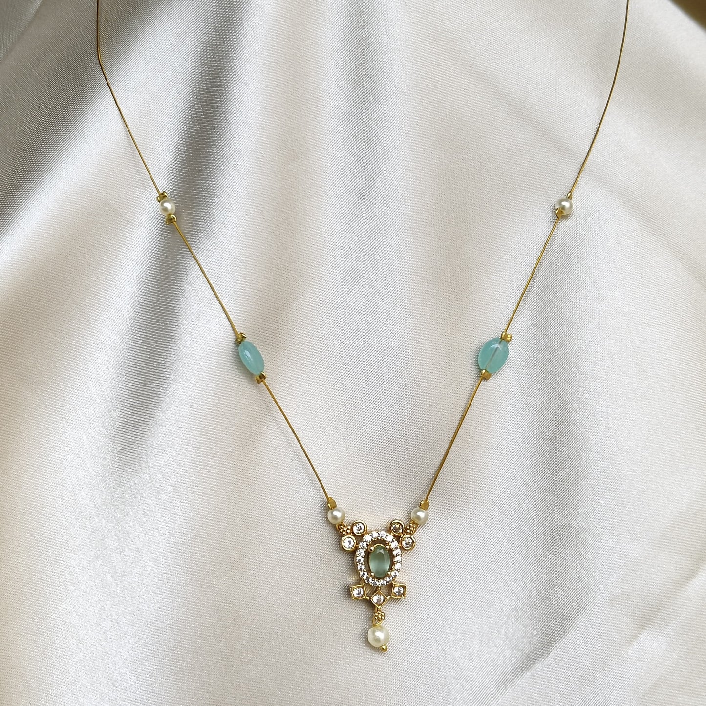 The Aditi Aqua & Pearl Invisible Chain