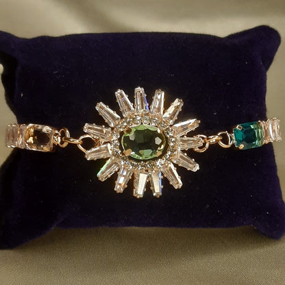 The Helios Emerald Sunburst Bolo Bracelet