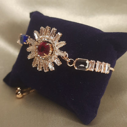 The Helios Ruby Sunburst Bolo Bracelet