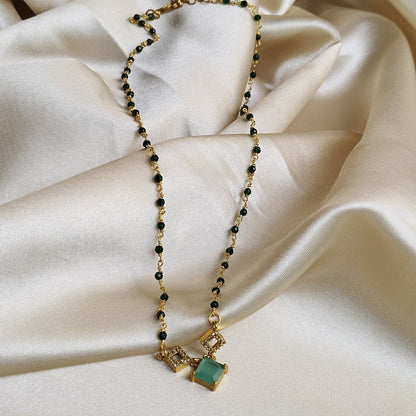Elegant Gold-Plated Necklace with Green Stone and Crystal Accents