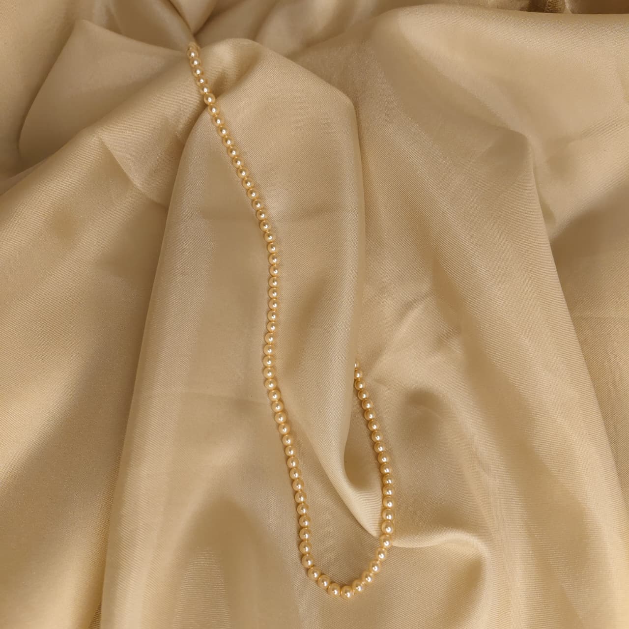 The Light Gold One Strand Swarovski Lumière Pearl Necklace