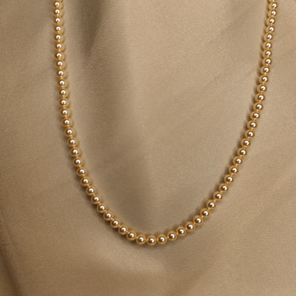The Light Gold One Strand Swarovski Lumière Pearl Necklace